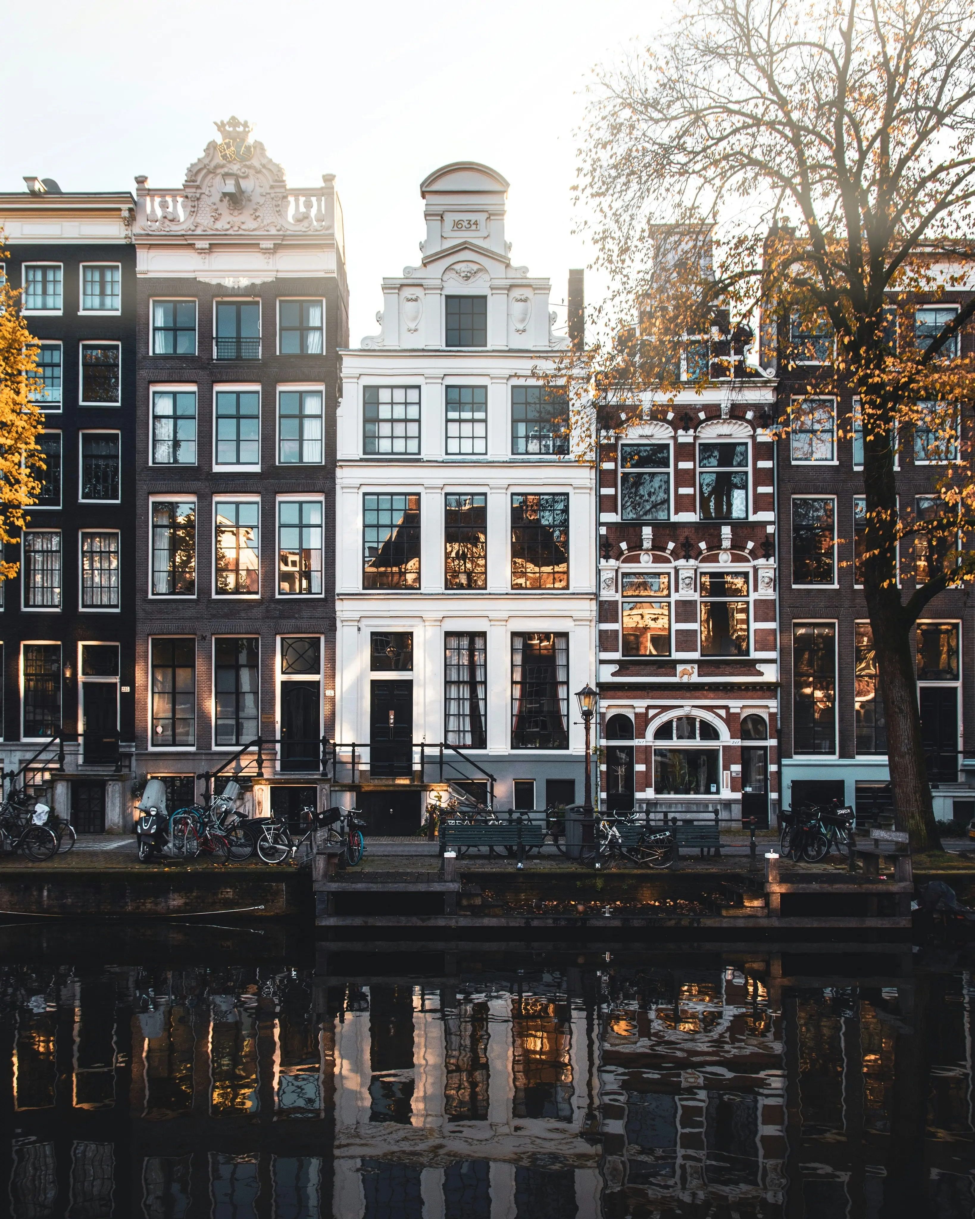Beautiful Amsterdam canals during golden hour sunrise